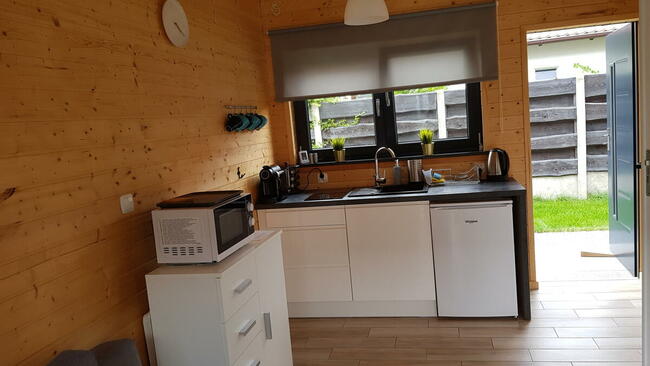 Osada Wypoczynku Jantar - Domki z Basenem, Sauną i Jacuzzi