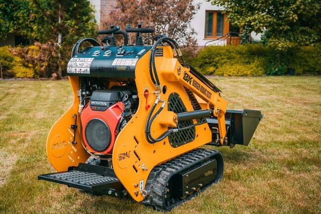 Ładowarka gąsienicowa Berger Kraus 323T Honda GX690 22,1 KM