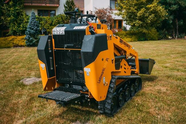 Ładowarka gąsienicowa Berger Kraus 327T KUBOTA 25KM
