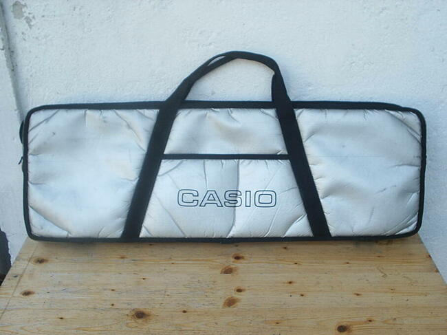 Historyczny Casio Casiotone CT-310 z osprzętem, rocznik 1984