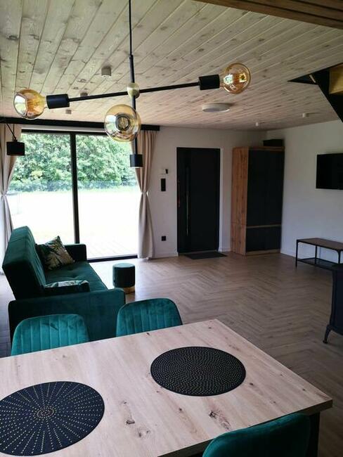 Domek z jacuzzi nad jeziorem.Mazury, balia, kominek