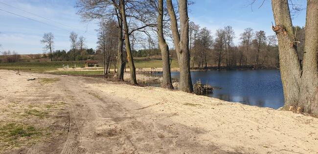 Ogrodzona działka budowlana - z widokiem na plażę i jezioro