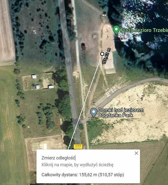 Ogrodzona działka budowlana - z widokiem na plażę i jezioro