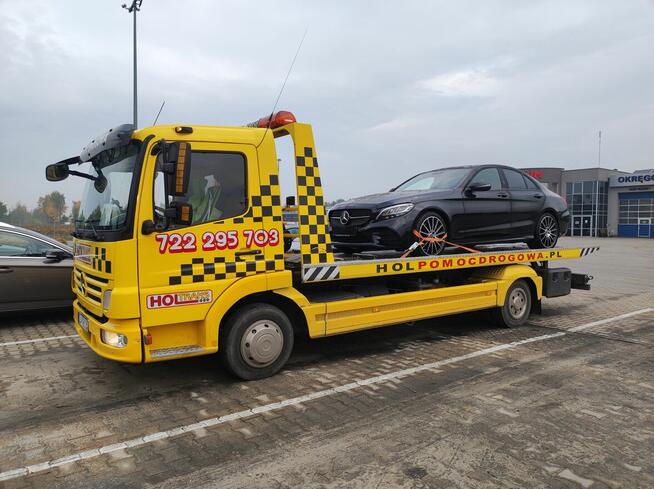 Nr tel.722295703 Transport maszyn, pomoc drogowa, holowanie,au