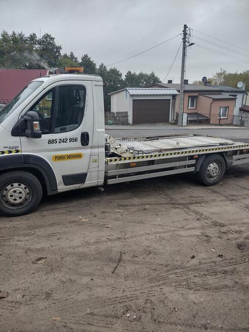 Pomoc drogowa , transport auto holowanie