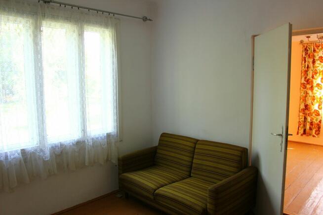 Leżajsk - do sprzedaży dom drewniany na działce 0,1180 ha