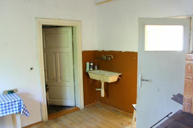 Leżajsk - do sprzedaży dom drewniany na działce 0,1180 ha