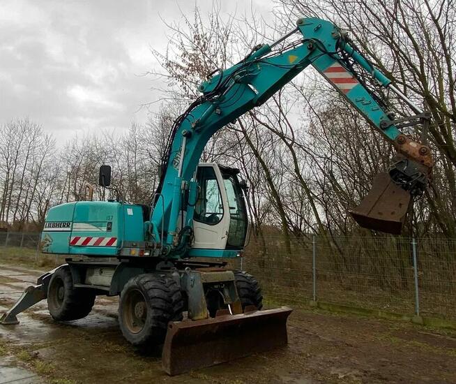 Koparka kołowa Liebherr A 314 LITRONIC 4x4 + łyżki