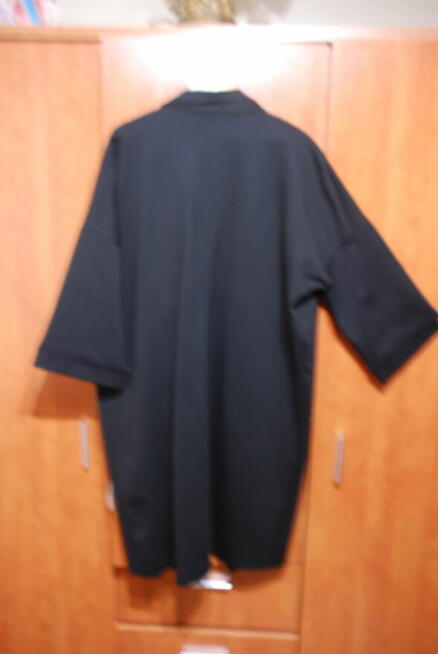 nowy jesiennoletni płaszcz