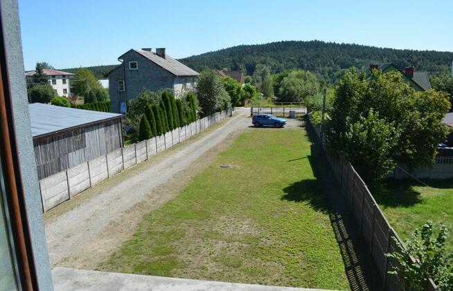 Nieruchomość zabudowana dwoma domami w zabudowie szeregowej