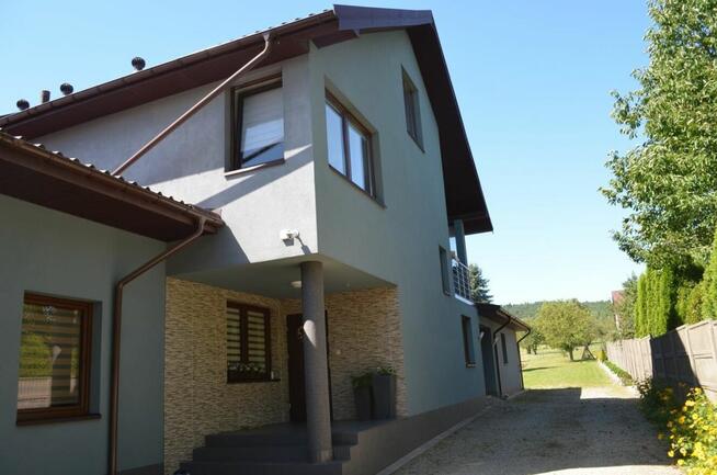 Nieruchomość zabudowana dwoma domami w zabudowie szeregowej