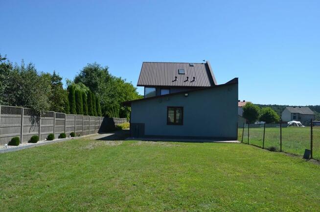 Nieruchomość zabudowana dwoma domami w zabudowie szeregowej