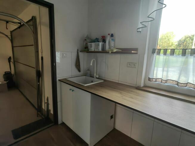 Sprzedam nowo wybudowany dom z garażem, działką 0,5 hektara