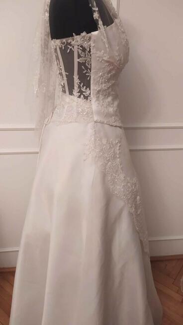 Sprzedam tanio suknie śllubną