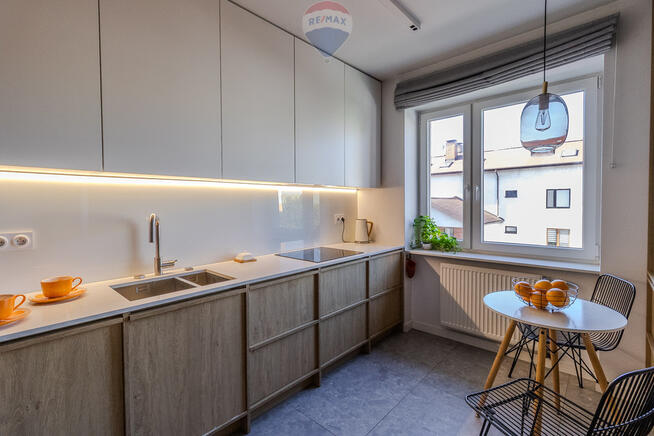 Dwupoziomowy apartament z loggią i garażem, Górna