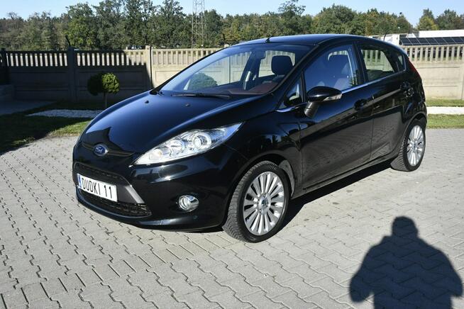 Ford Fiesta 1,4BENZ Serwis.Alu.Serwis.Klimatyzacja.Halogeny.El.szyby.Centralka