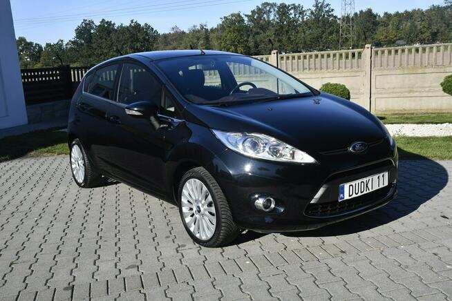 Ford Fiesta 1,4BENZ Serwis.Alu.Serwis.Klimatyzacja.Halogeny.El.szyby.Centralka