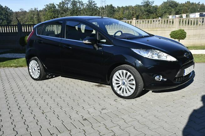 Ford Fiesta 1,4BENZ Serwis.Alu.Serwis.Klimatyzacja.Halogeny.El.szyby.Centralka