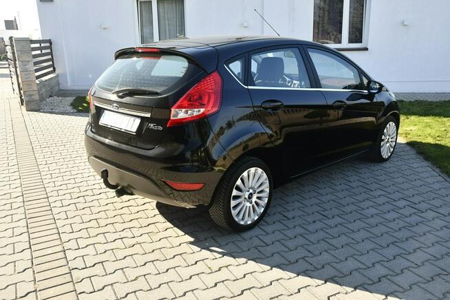 Ford Fiesta 1,4BENZ Serwis.Alu.Serwis.Klimatyzacja.Halogeny.El.szyby.Centralka