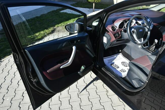 Ford Fiesta 1,4BENZ Serwis.Alu.Serwis.Klimatyzacja.Halogeny.El.szyby.Centralka
