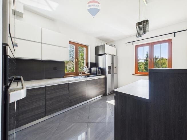 Nowoczesny dom z klimatem – działka ponad 1 ha