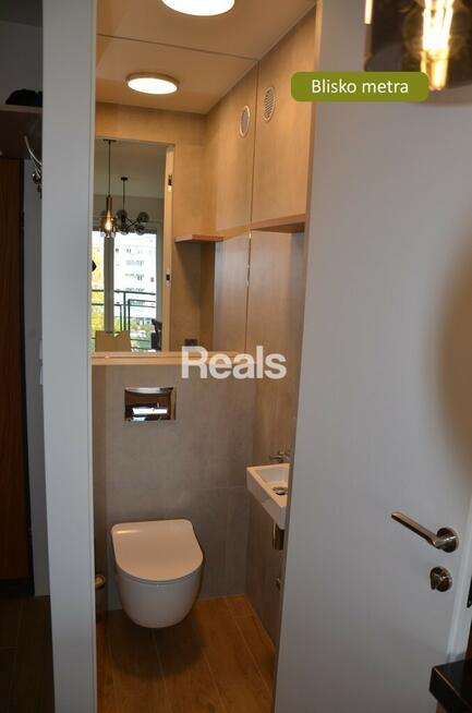 Z komórką i garażem