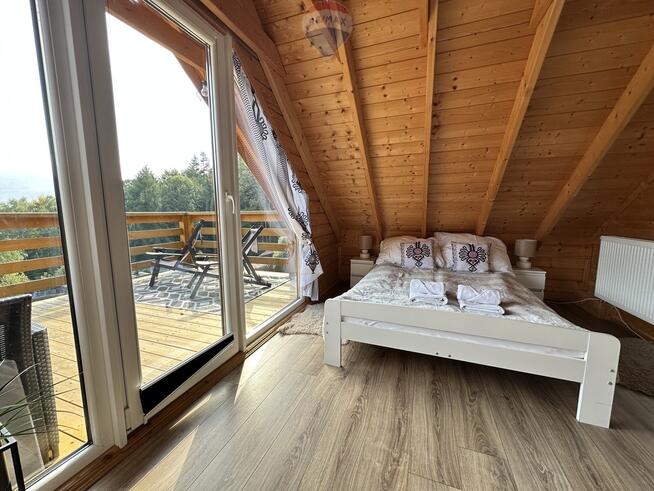 Całoroczny domek z widokiem na jezioro i góry