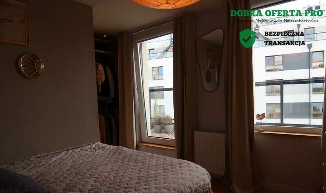 Dwupoziomowe mieszkanie z ogródkiem na dachu