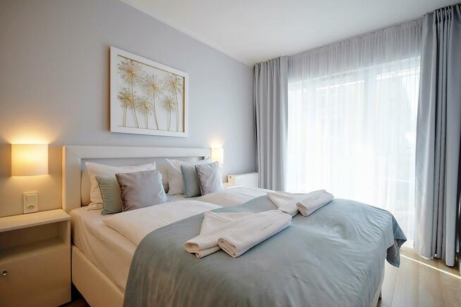 Mieszkanie Ustronie Morskie, Okrzei