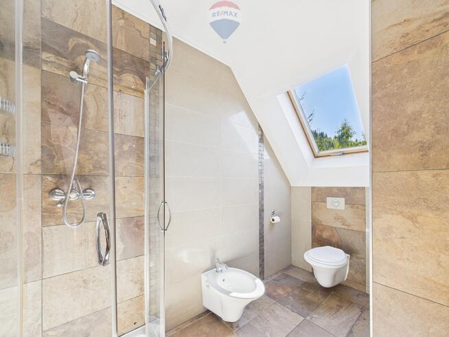 Dom wolnostojący z garażem- Łopuszna