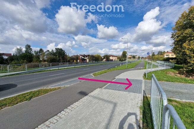 Duża łąka nad Krzną przy nowym moście i ścieżce