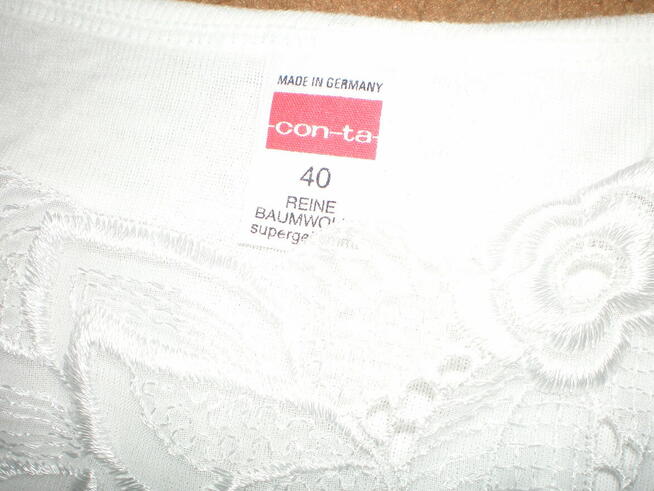 Sprzedam podkoszulkę damską, bawełnianą, białą, używaną.