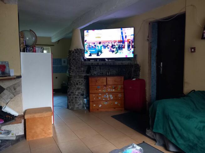 Sprzedam Połowę domu z działką