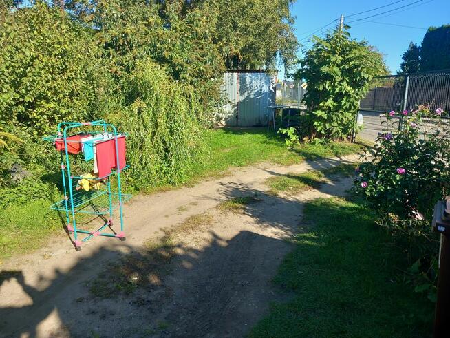 Sprzedam Połowę domu z działką