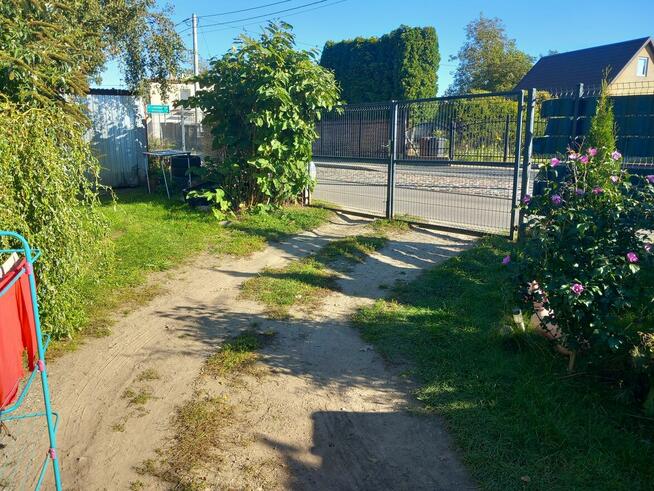 Sprzedam Połowę domu z działką