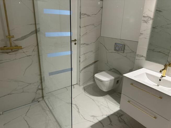 Nowy, luksusowy i ekskluzywnie wykończony apartament o pow.: