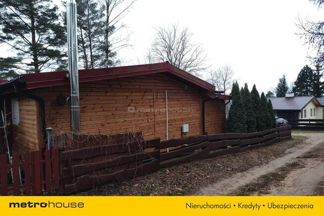 Domek rekreacyjny w lesie nad jeziorem Narie.