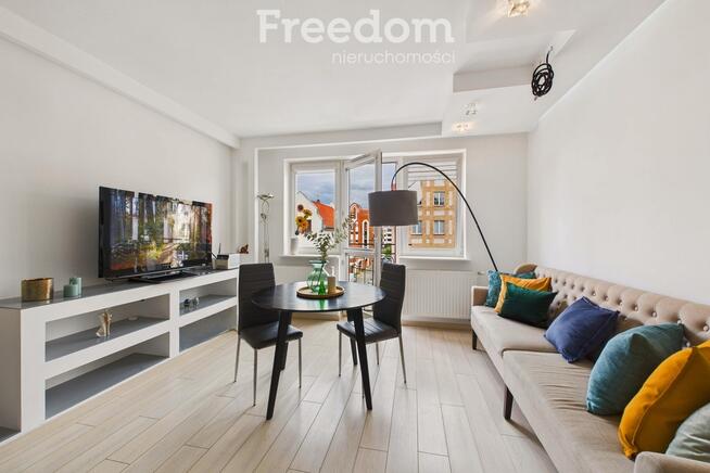 Apartament z widokiem na Bramę Targową.