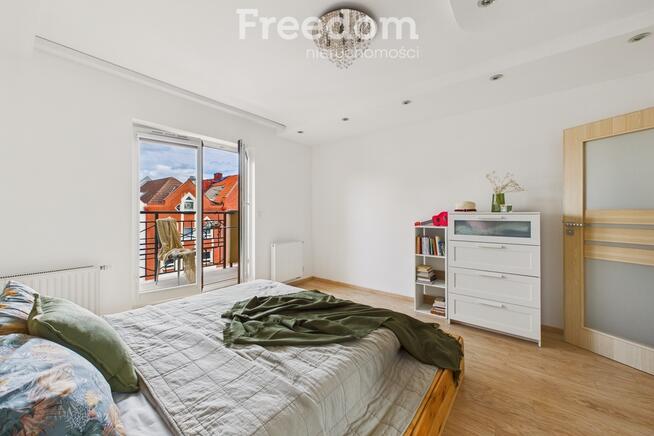 Apartament z widokiem na Bramę Targową.