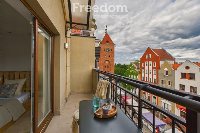 Apartament z widokiem na Bramę Targową.