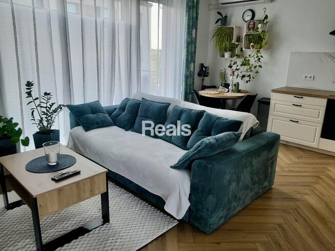 Słoneczne mieszkanie w domu szeregowym.