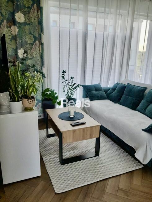 Słoneczne mieszkanie w domu szeregowym.