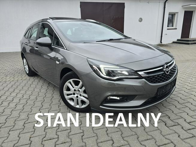 Opel Astra 1,4Turbo Benz. Navi.Kam.Cof.Asystent Pasa Ruchu.Ledy.Szyberdach.OKAZJA