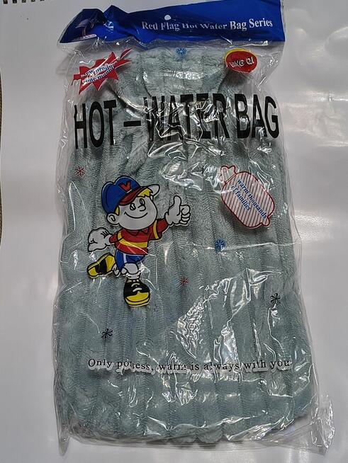 Nowy termofor gumowy z puszystym pokrowcem błękitny