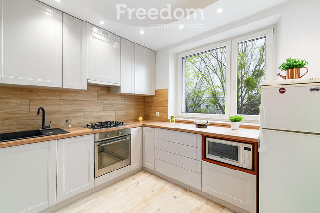 Słoneczne mieszkanie w bloku z cegły