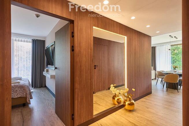 Apart 3 pok. nad promenadą, duży narożny taras.