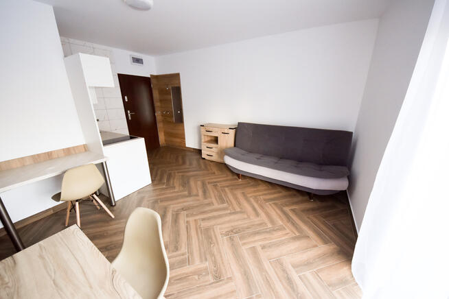 Mieszkanie z podwórkiem i miejscem parkingowym