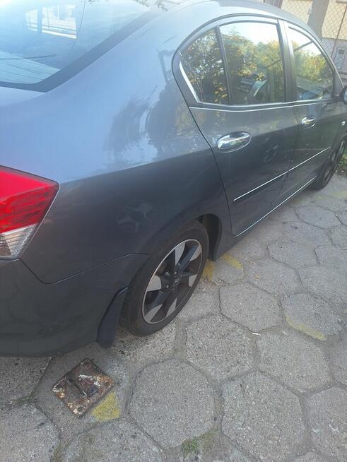 Sprzedam honda city 1.4 b 100km .