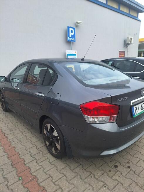 Sprzedam honda city 1.4 b 100km .