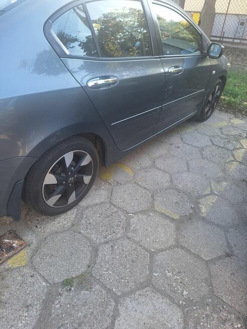 Sprzedam honda city 1.4 b 100km .
